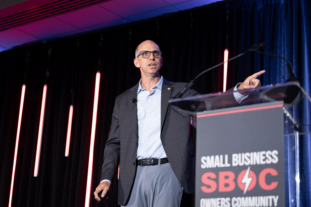 Pat Miller speaking on stage at the SBOC Conference